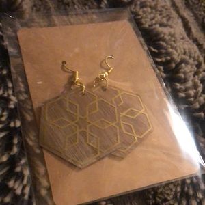 Homemade wooden earrings in gold